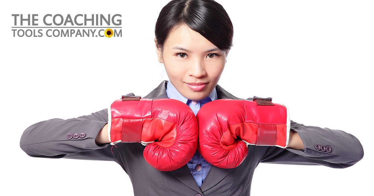 Motivated Leader wearing red boxing gloves