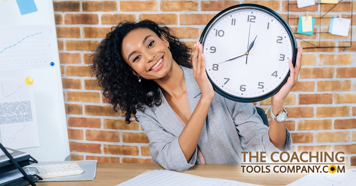 Happy Client Holding Clock at desk for Time Management