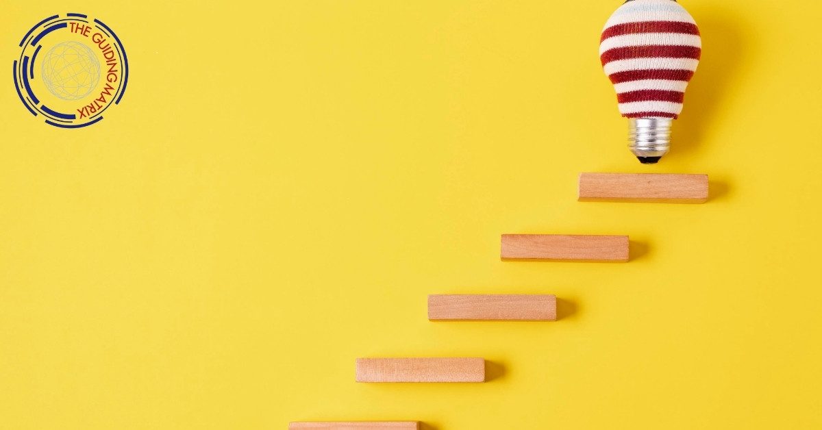 Steps leading upward toward a covered lightbulb.