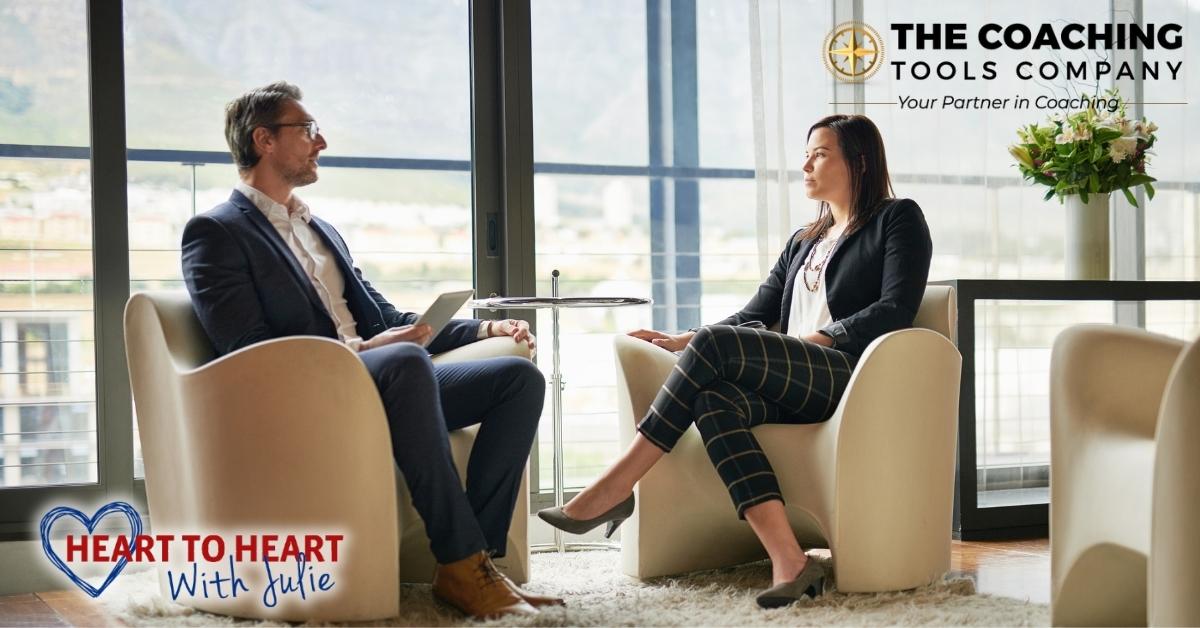 Professional coaching conversation about giving feedback in the workplace